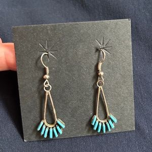 Bear claw earrings.
